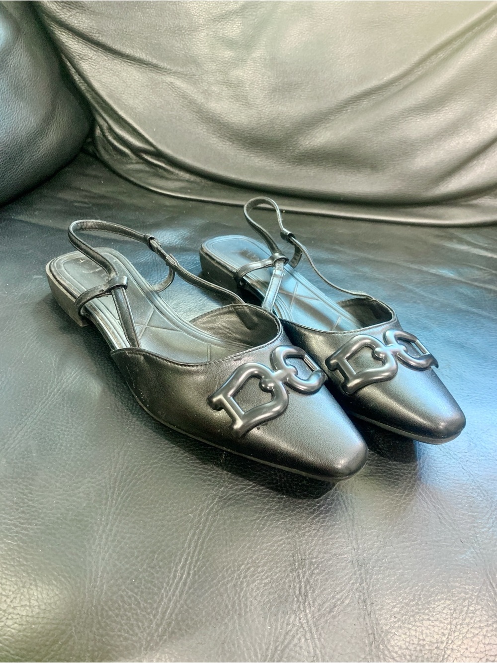 Black Leather Slingback Flats with Decorative Chain Accent